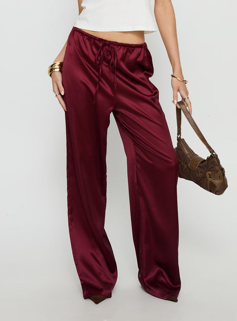 back view of model wearing Princess Polly Soulstar Satin Pants Wine Mid Rise Pants 