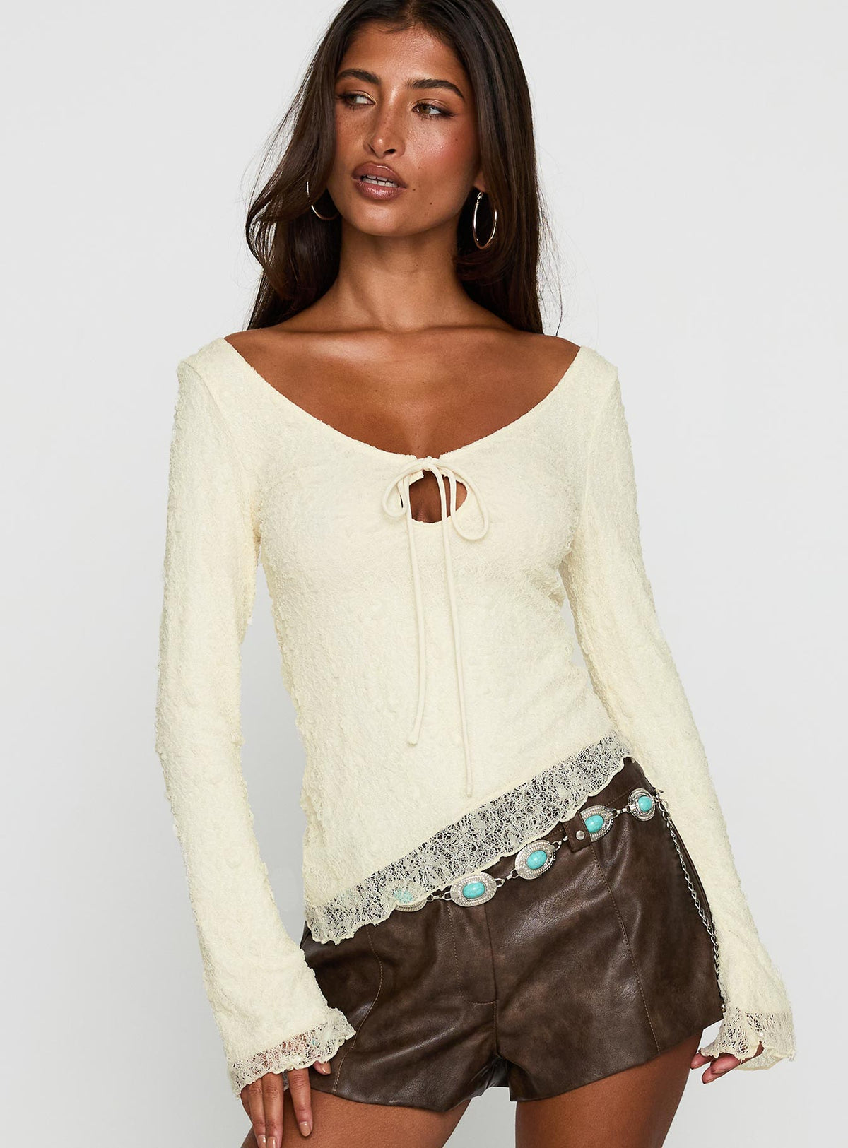 front view of model wearing Princess Polly Hyacinthe Long Sleeve Top Cream Full Sleeves Scoop Neck 