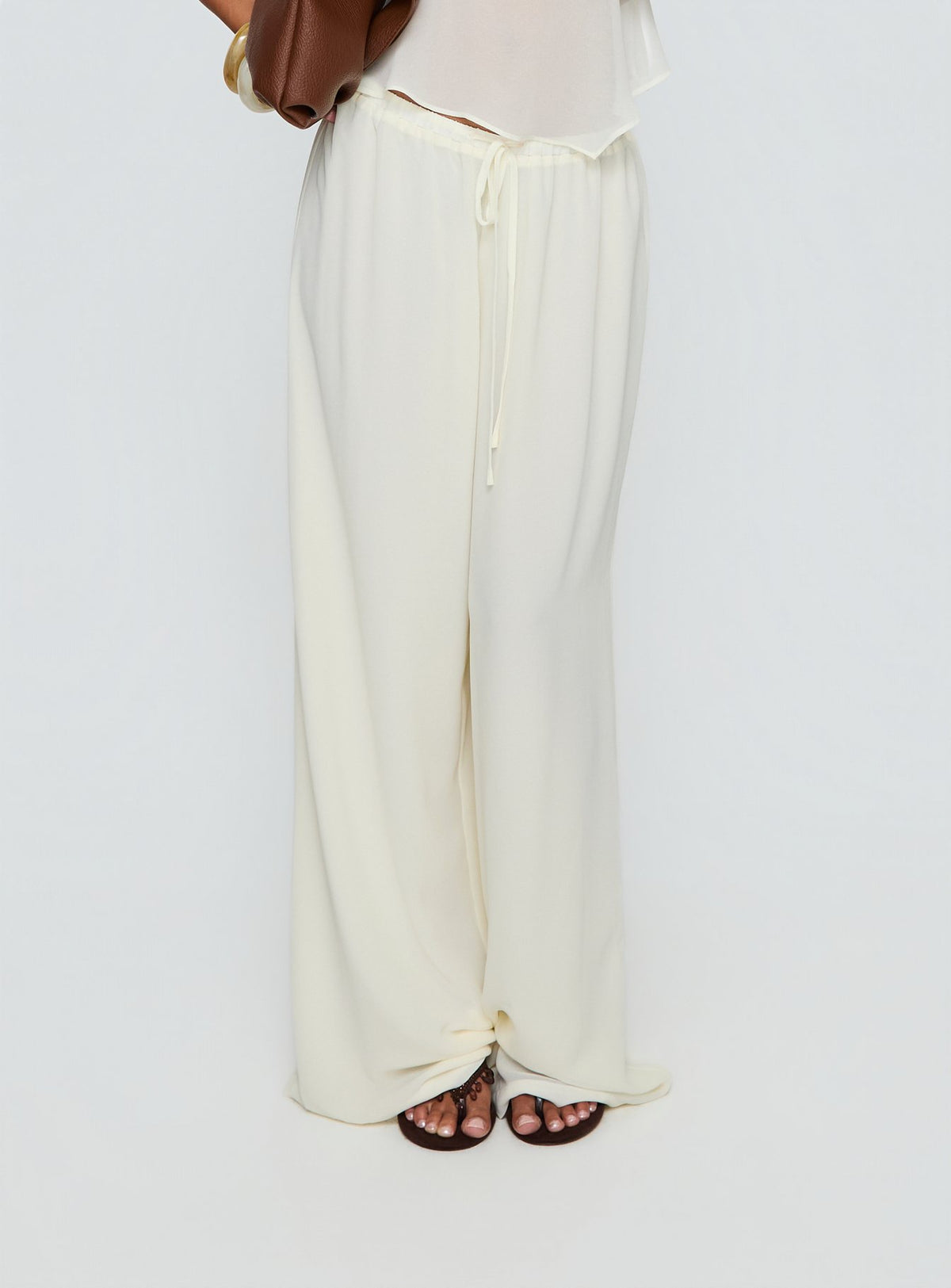 back view of model wearing Princess Polly Finesse Pants Yellow High Rise Pants 