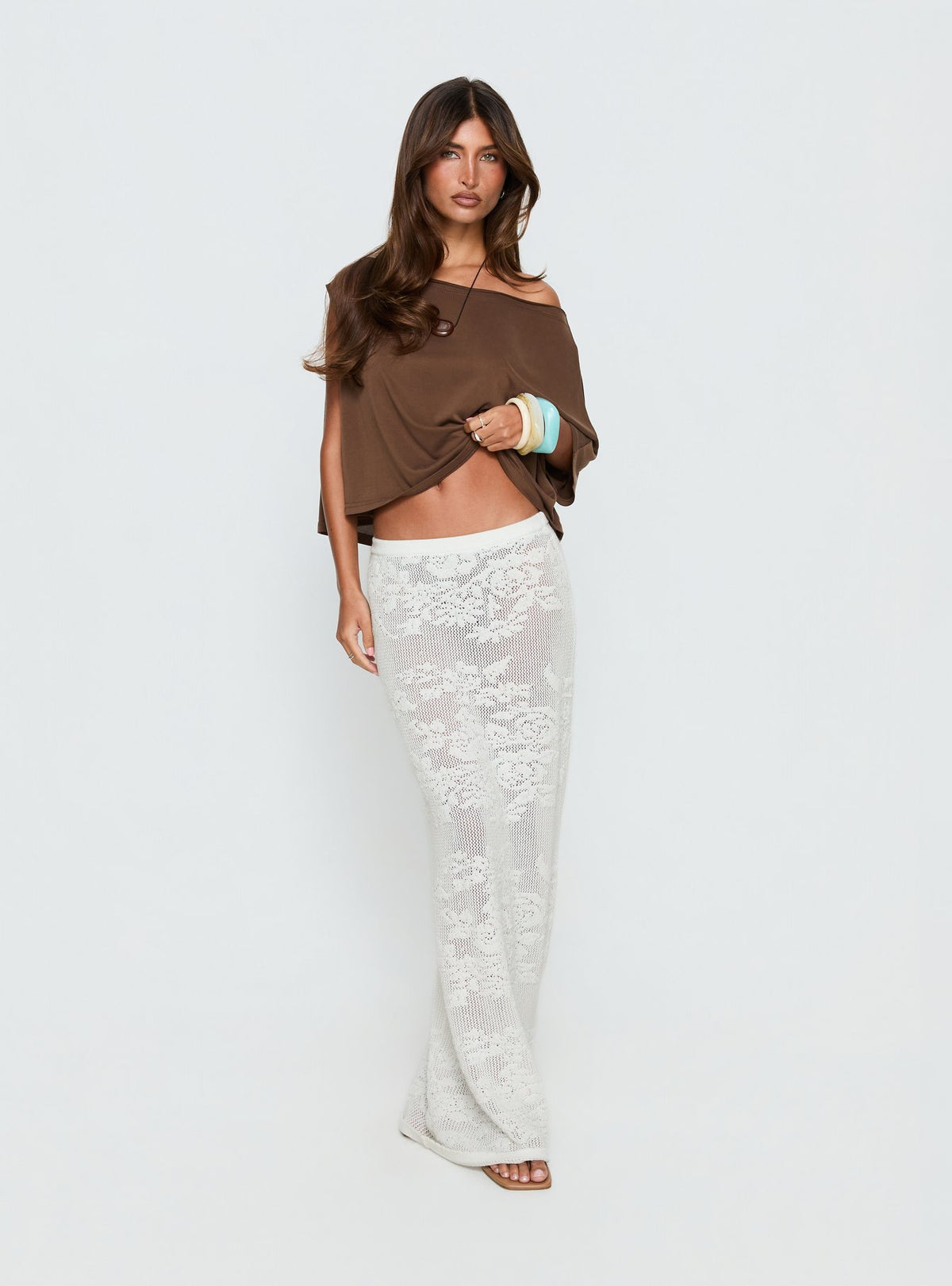   side view of model wearing Princess Polly Opresia Crochet Maxi Skirt White Maxi Skirts 