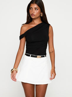 front view of model wearing Princess Polly Barrymore Mini Skort White Low Rise Shorts 