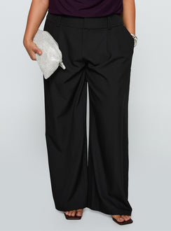 back view of model wearing Princess Polly Two Lovers Low Rise Pants Black Curve Low Rise Pants 