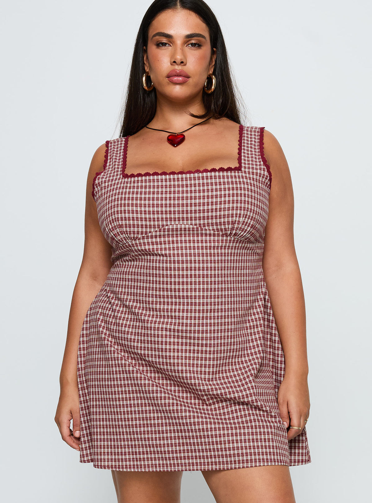 front view of model wearing Princess Polly Dasha Mini Dress Red Check Curve Square Neck 