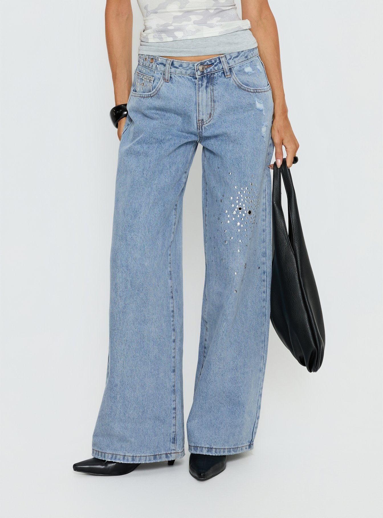 back view of model wearing Princess Polly Candi Mid Rise Wide Leg Studded Jeans Light Blue Wash Mid Rise Jeans 