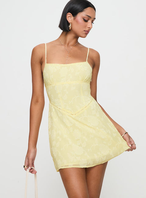 front view of model wearing Princess Polly South Of France Mini Dress Yellow Petite Square Neck 