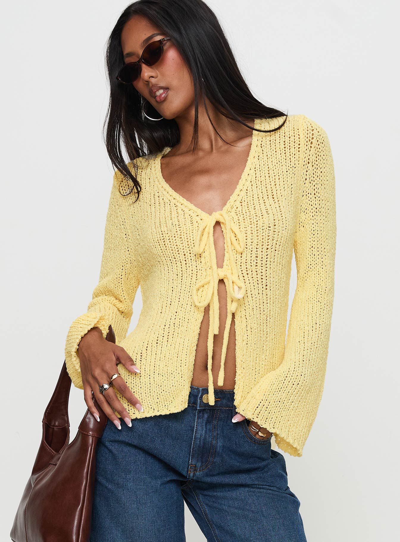 back view of model wearing Princess Polly Swain Knit Cardigan Lemon 