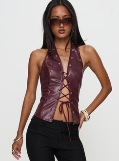 front view of model wearing Princess Polly I've Been There Faux Leather Halter Top Red Sleeveless V-Neck 
