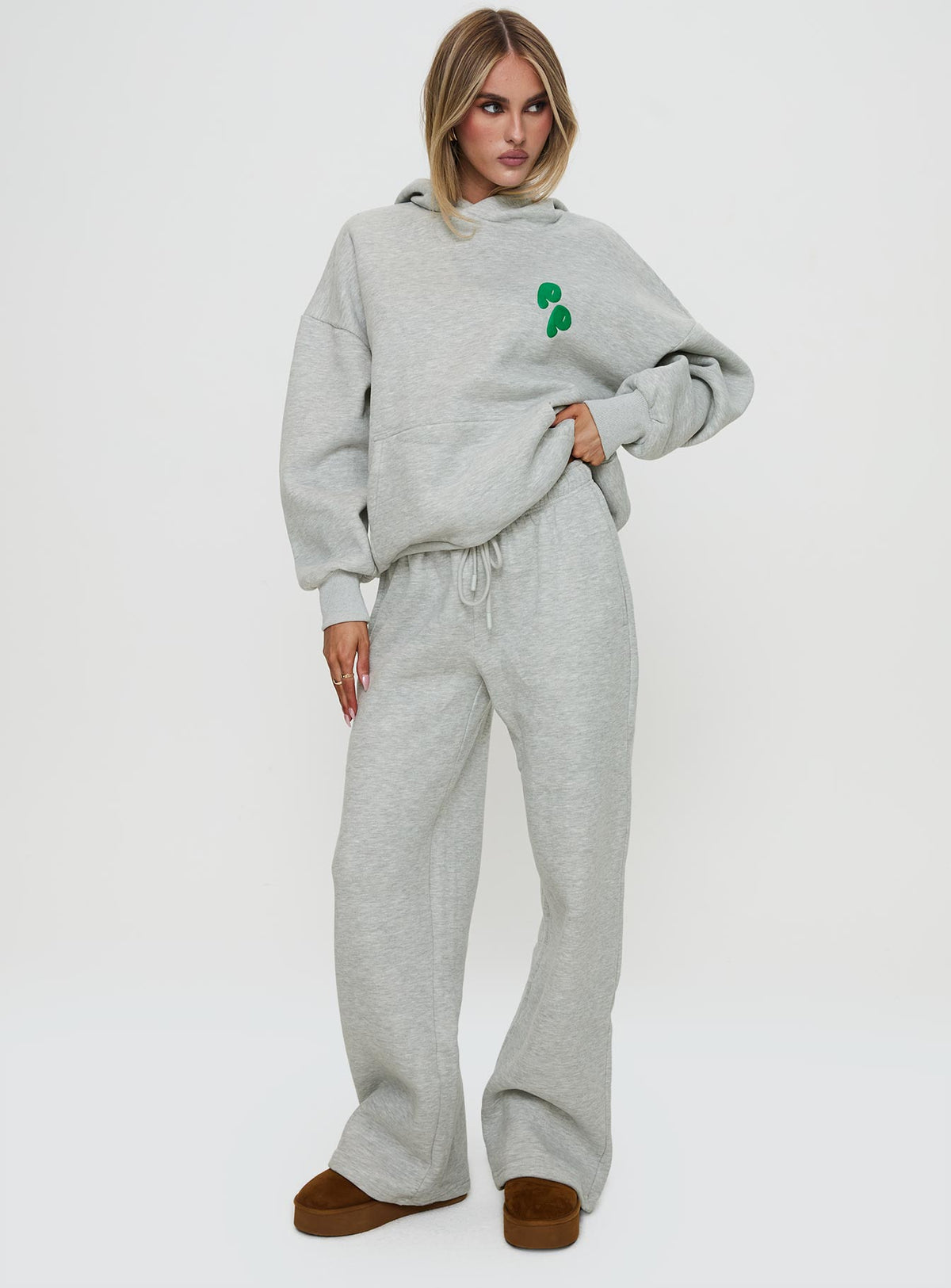 front view of model wearing Princess Polly Princess Polly Wide Leg Track Pant Bubble Text Grey Marle / Green Pants 