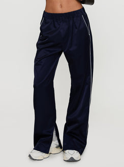 side view of model wearing Princess Polly Travalta Satin Track Pant Navy Low Rise Pants Pants 