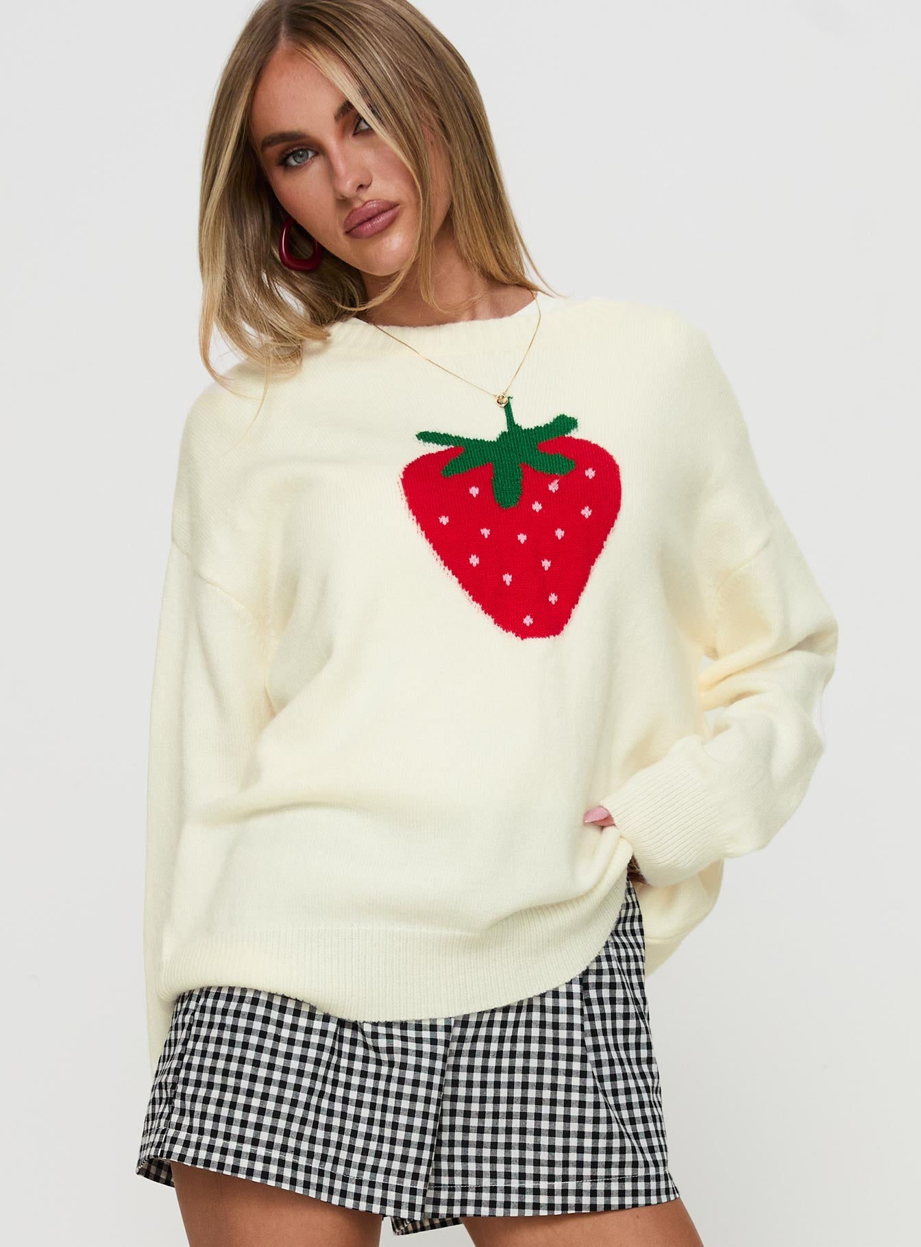 side view of model wearing Princess Polly Living Is Easy Knit Sweater White Long 