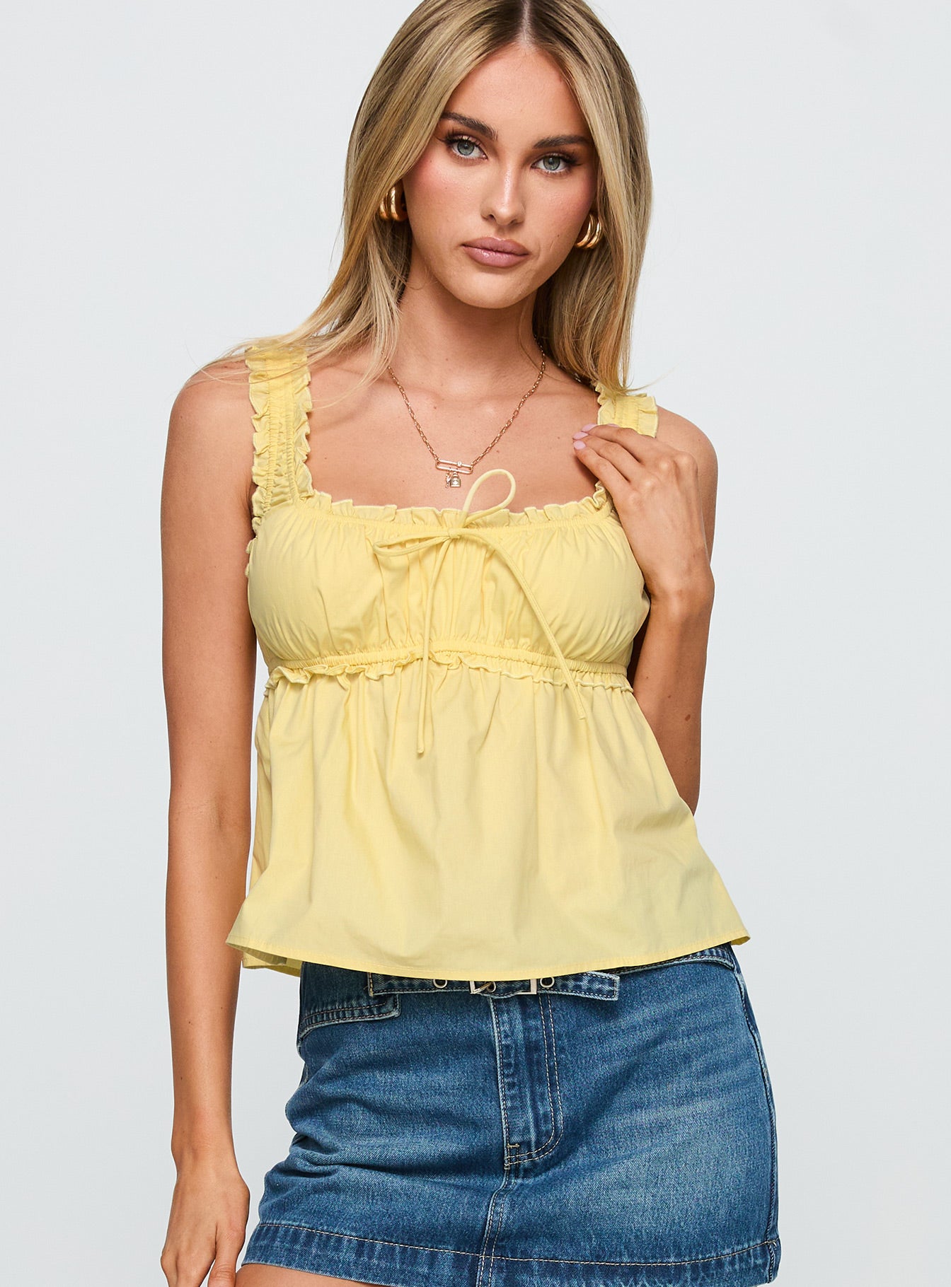front view of model wearing Princess Polly Thalira Top Yellow Sleeveless Square Neck 