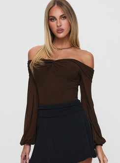 Featuring the Babette Off The Shoulder Bodysuit in Brown womens-bodysuit designed with full sleeves and ruched details front view of model wearing
