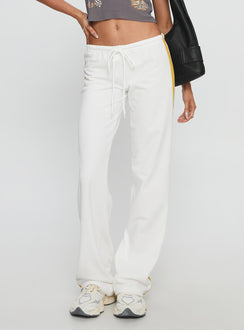 back view of model wearing Princess Polly Elation Low Rise Straight Leg Track Pant White Low Rise Pants 