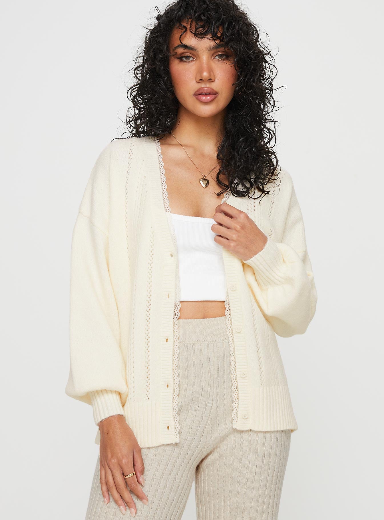 front view of model wearing Princess Polly Oakleigh Cardigan Cream Long 