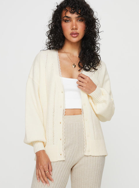 front view of model wearing Princess Polly Oakleigh Cardigan Cream Long 