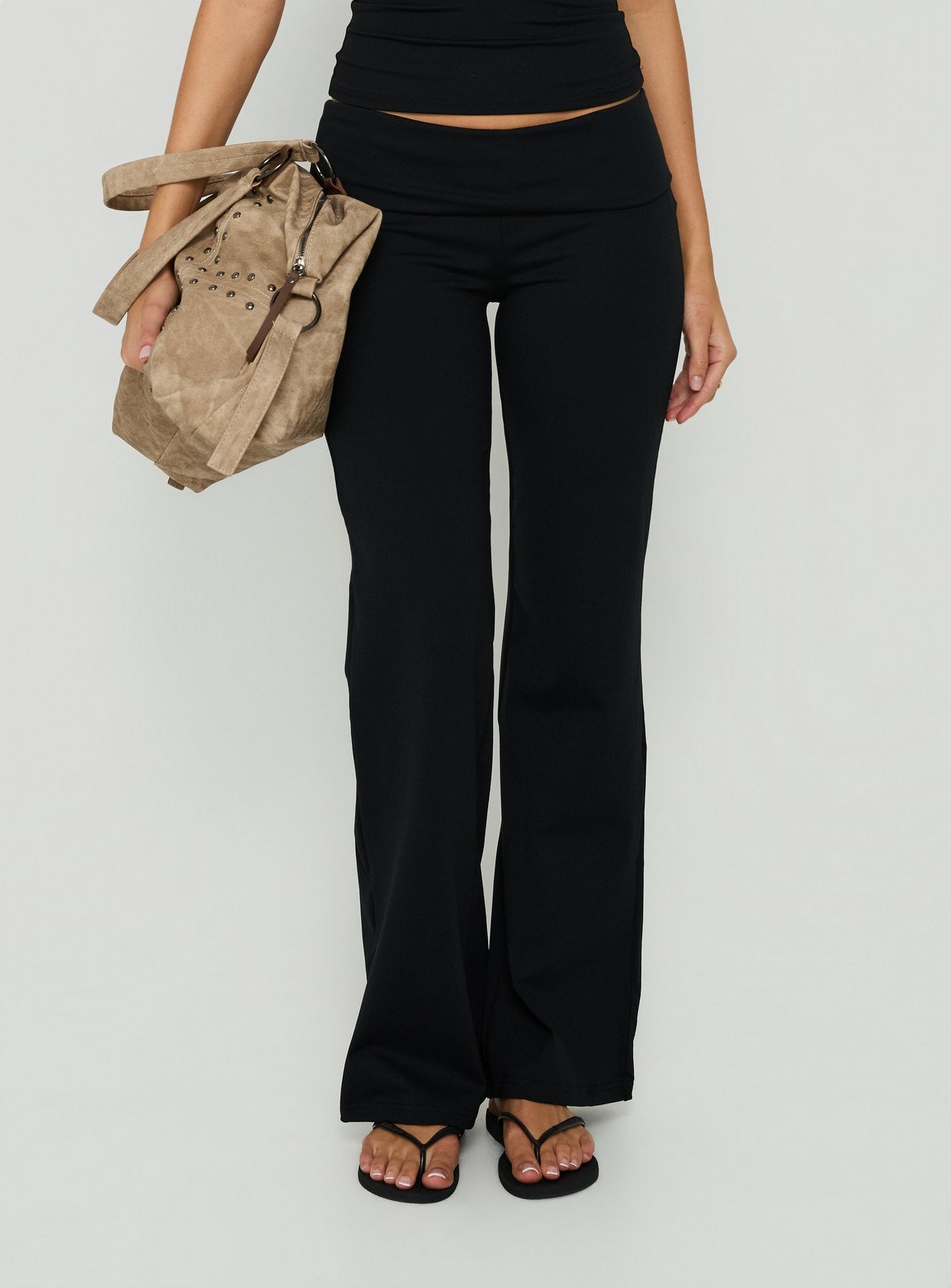Highlighting Daily Define Foldover Waist Pants Black womens-regular-pants featuring high-rise detail view of model wearing