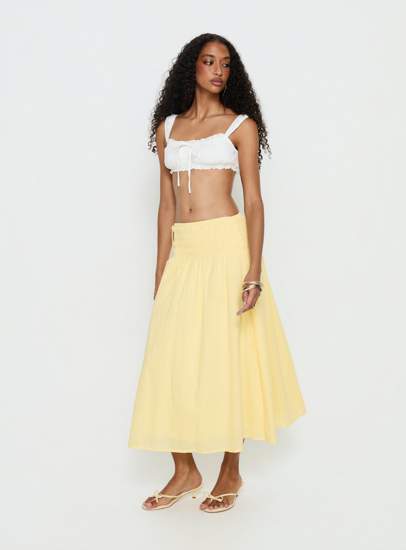   front view of model wearing Princess Polly Vence Ruched Maxi Skirt Lemon Yellow Maxi Skirts 