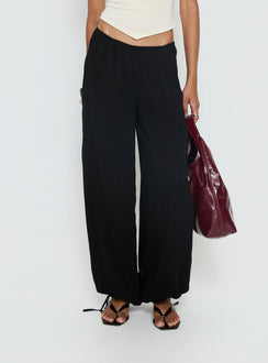 back view of model wearing Princess Polly Moondancer Balloon Pants Black Mid Rise Pants 