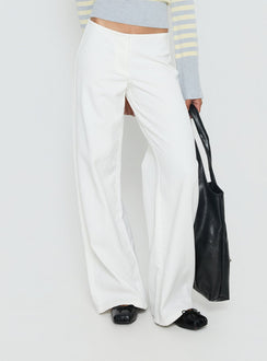 back view of model wearing Princess Polly Hereos Mid Rise Baggy Leg Jeans White Mid Rise Jeans 