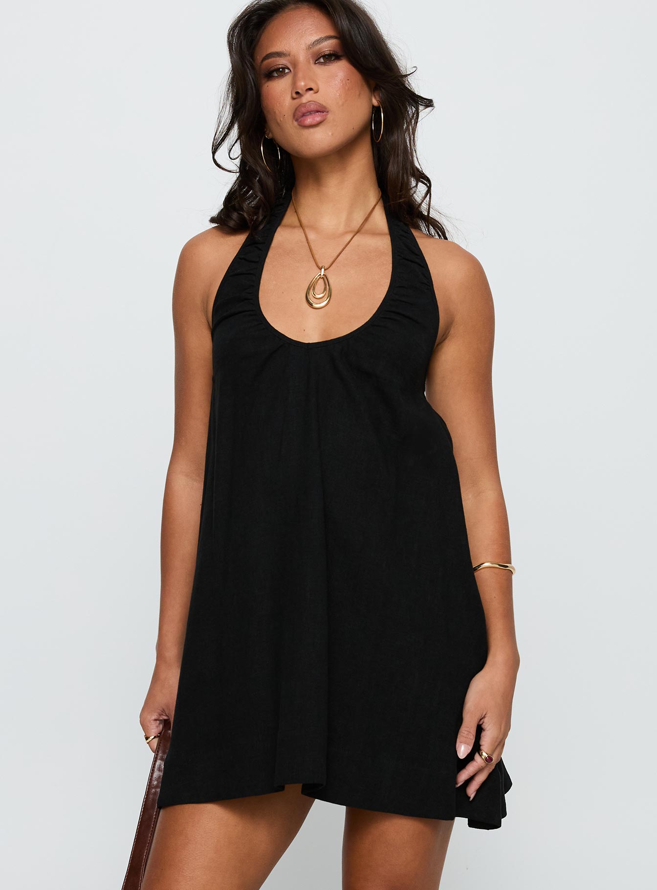 front view of model wearing Princess Polly Daydreams Linen Blend Halter Mini Dress Black Scoop Neck 