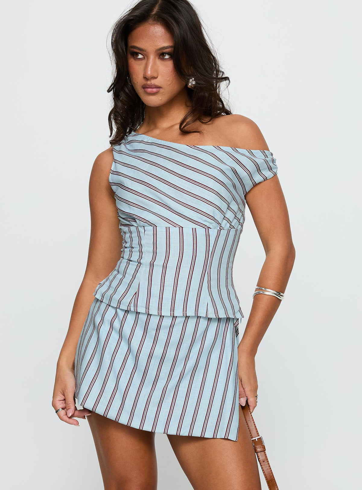 front view of model wearing Princess Polly Gulliver Tie Side Mini Skort Blue / Maroon Stripe High Waisted Shorts 