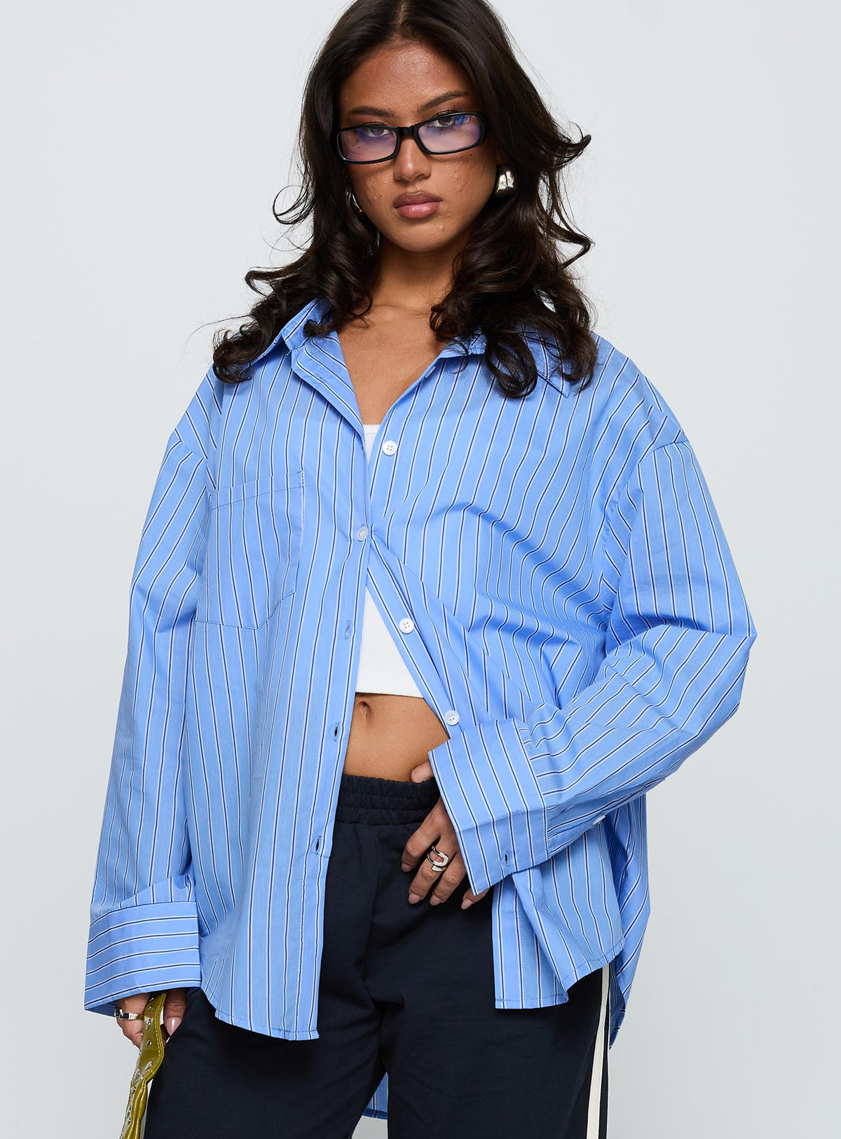front view of model wearing Princess Polly Kodhi Oversized Long Sleeve Top Blue Stripe Full Sleeves V-Neck 