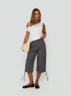 Showcasing the Alfonza Utility Capri in Slate womens-regular-pants with mid-rise cargo design side view of model wearing Princess Polly