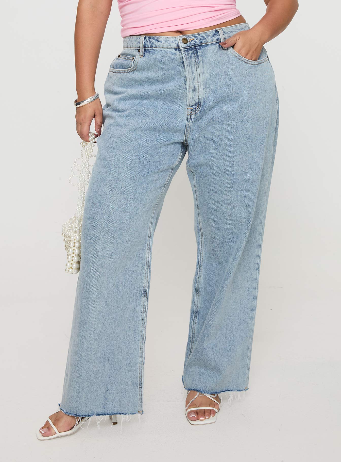 front view of model wearing Princess Polly Fawcett Jeans Light Wash Denim Curve High Waisted 