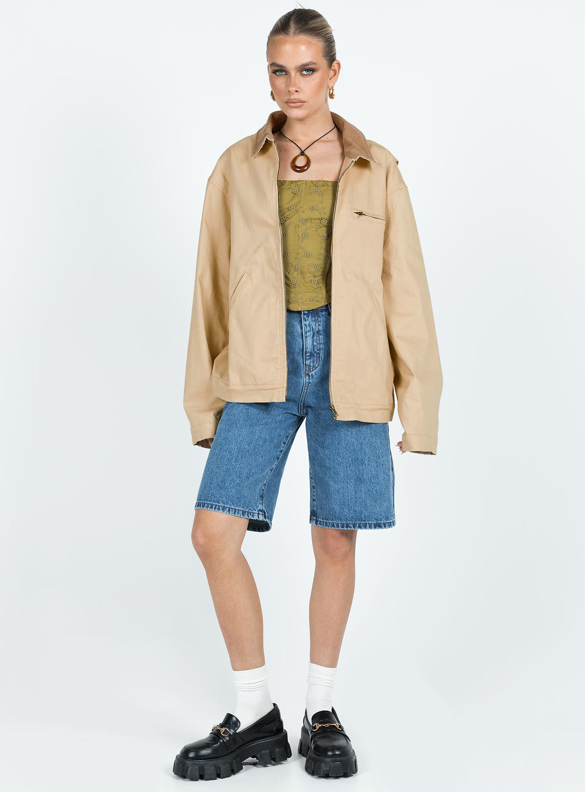 Jacket Corduroy classic collar Brass toned hardware Zip front fastening Twin hip pockets Snap button closure along cuffs Plaid lining