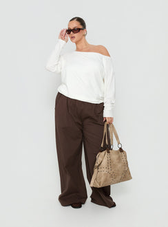 Crafted with the Lunea Concealed Waistband Pants Brown Curve in womens regular pants featuring high-rise styling side view of model wearing Princess Polly