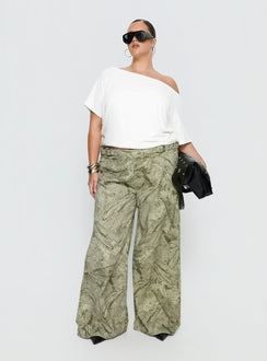 side view of model wearing Princess Polly Mckinley Mid Rise Wide Leg Jeans Camouflage Curve Mid Rise Jeans 