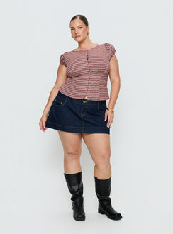 back view of model wearing Princess Polly Warna Low Rise Denim Mini Skirt Dark Wash Curve Mini Skirts 