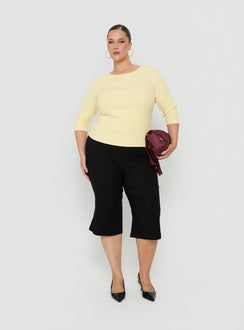 Showcase the Samaira Capri Pant Black Curve womens-regular-pants featuring high-rise detail view of model wearing Princess Polly