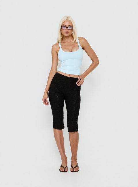 front view of model wearing Princess Polly Samaira Capri Pant Black Anglaise Mid Rise Pants 