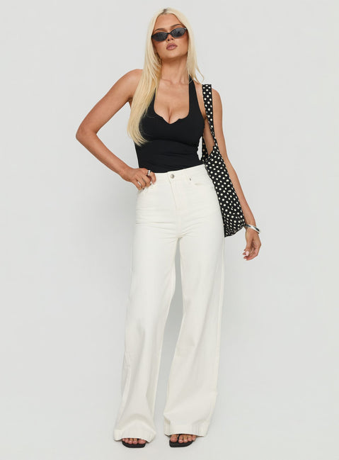front view of model wearing Princess Polly Goldie High Rise Wide Leg Jeans White High Rise Jeans 