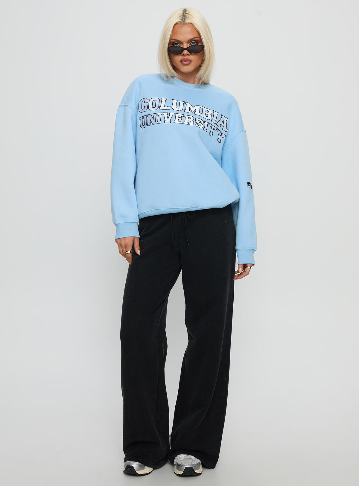 side view of model wearing Princess Polly Columbia Offside Crewneck Sweatshirt Blue Long 