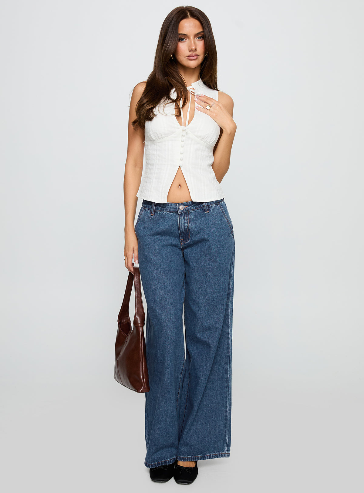 front view of model wearing Princess Polly Hyde Baggy Jeans Mid Blue Low Rise Jeans 