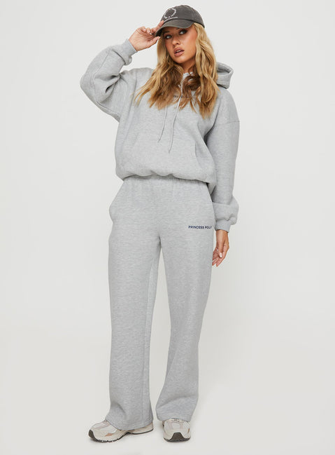 side view of model wearing Princess Polly Princess Polly Hooded Sweatshirt Bubble Text Grey Marle / Slate Jumpers 