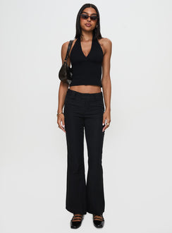 side view of model wearing Princess Polly Jinxed Pant Black Low Rise Pants Pants 