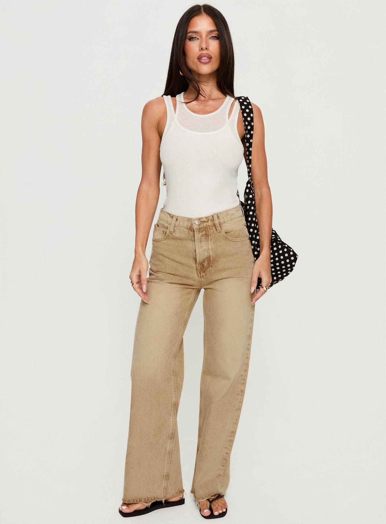 front view of model wearing Princess Polly Fawcett High Rise Straight Leg Jeans Tan High Rise Jeans 