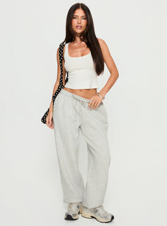 front view of model wearing Princess Polly Caspa Dream Fleece Oversized Ankle Cuff Jogger Grey Marle High Rise Pants 
