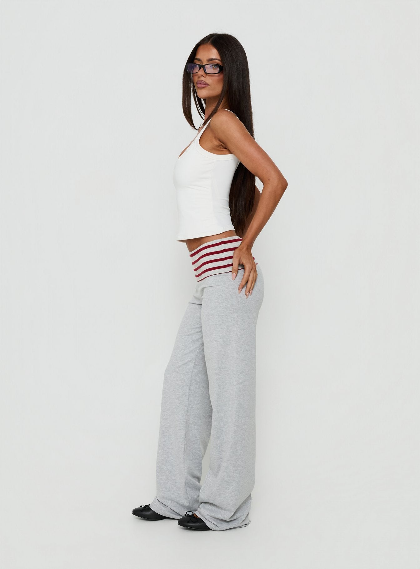 Designed with Jetset Pants Grey / Red Stripe womens-regular-pants featuring mid-rise side view of model wearing