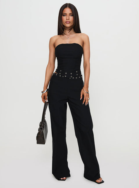 back view of model wearing Princess Polly Passionette Pants Black Petite High Waisted Pants 