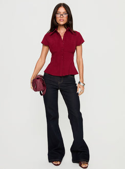 front view of model wearing Princess Polly Magic Mirror Mid Rise Bootleg Jeans Raw Indigo Mid Rise Jeans 