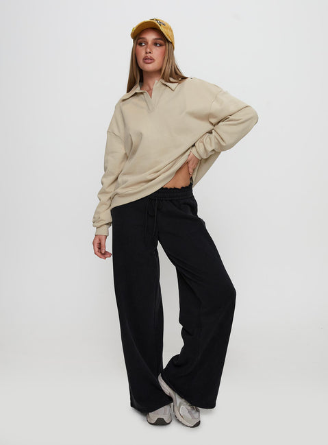 back view of model wearing Princess Polly Back Around Collared Fleece Jumper Oat Long 
