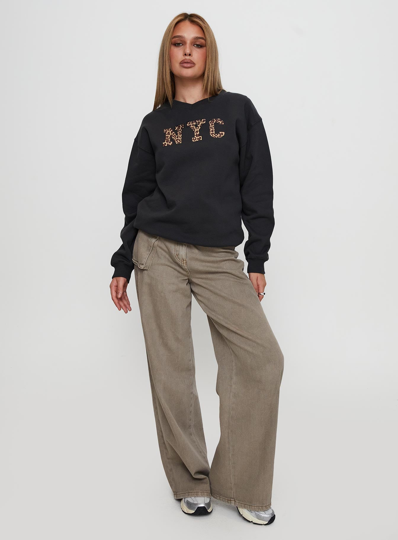 side view of model wearing Princess Polly Wild In NYC Sweater Black 