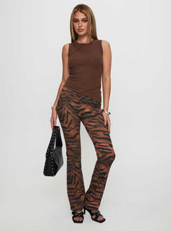 side view of model wearing Princess Polly Morganah Aysmmetrical Top Brown Sleeveless Crew Neck 