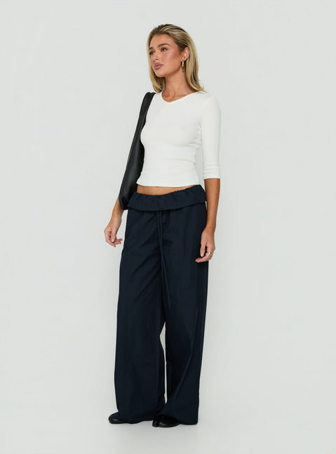 Crafted with the Amaiza Frill Drawstring Straight Leg Pants Navy in womens-regular-pants with high-rise side view of model wearing Princess Polly
