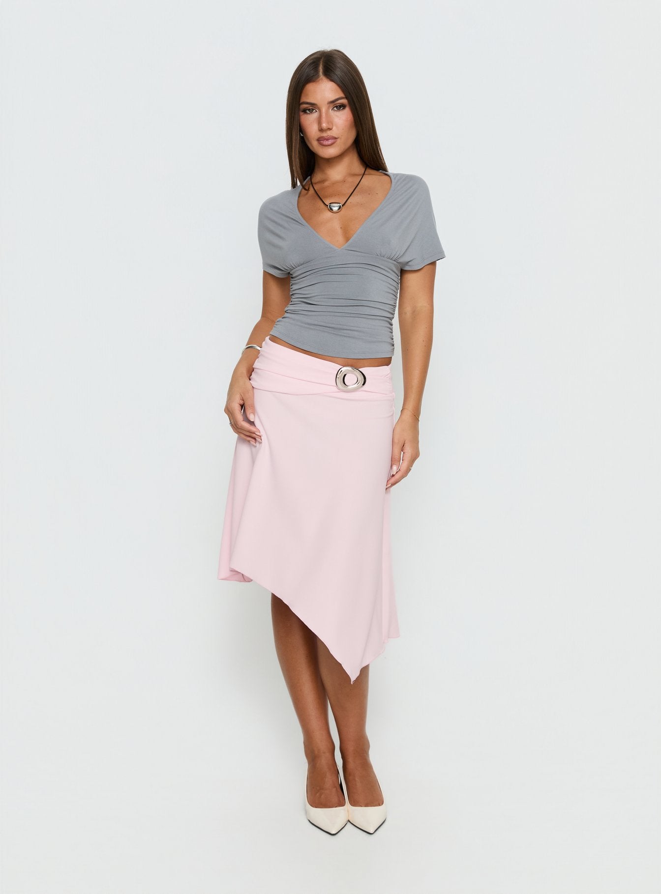   front view of model wearing Princess Polly Ismora Asymmetrical Midi Skirt Pink 
