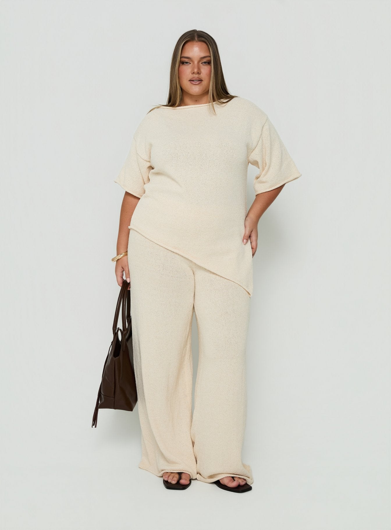 Showcasing Calisse Knit Wide Leg Pants Beige Curve womens-regular-pants with high-rise front view of model wearing